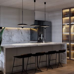 A imagem apresenta o pendente LED Abbie da Nordecor, com sua forma simples e elegante, iluminando a bancada de uma cozinha moderna, realçando o design e a funcionalidade do espaço.