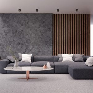 A imagem apresenta o Spot Led de Sobrepor SKEL da Nordecor, cuidadosamente posicionado no teto para complementar a iluminação da sala de estar. Com seu design moderno e discreto, os spots fornecem uma iluminação focalizada que realça a textura das paredes e a decoração do ambiente, oferecendo funcionalidade e um toque de sofisticação ao espaço.