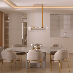 Round marble dining table surrounded by beige upholstered chairs with gold legs in a modern kitchen-dining room, with a crystal chandelier above.