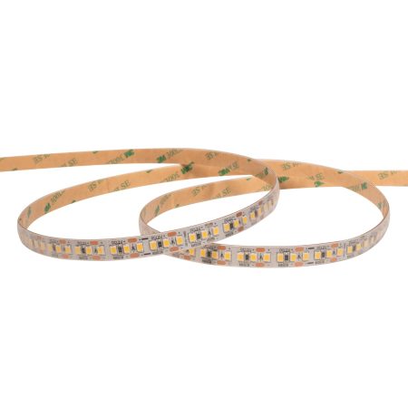 Flexible LED strip light with multiple small LEDs arranged along a beige ribbon on a white background.