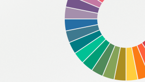 Curved color spectrum arc made of wedge-shaped segments in a rainbow of colors on a light textured background, occupying the right side of the image.